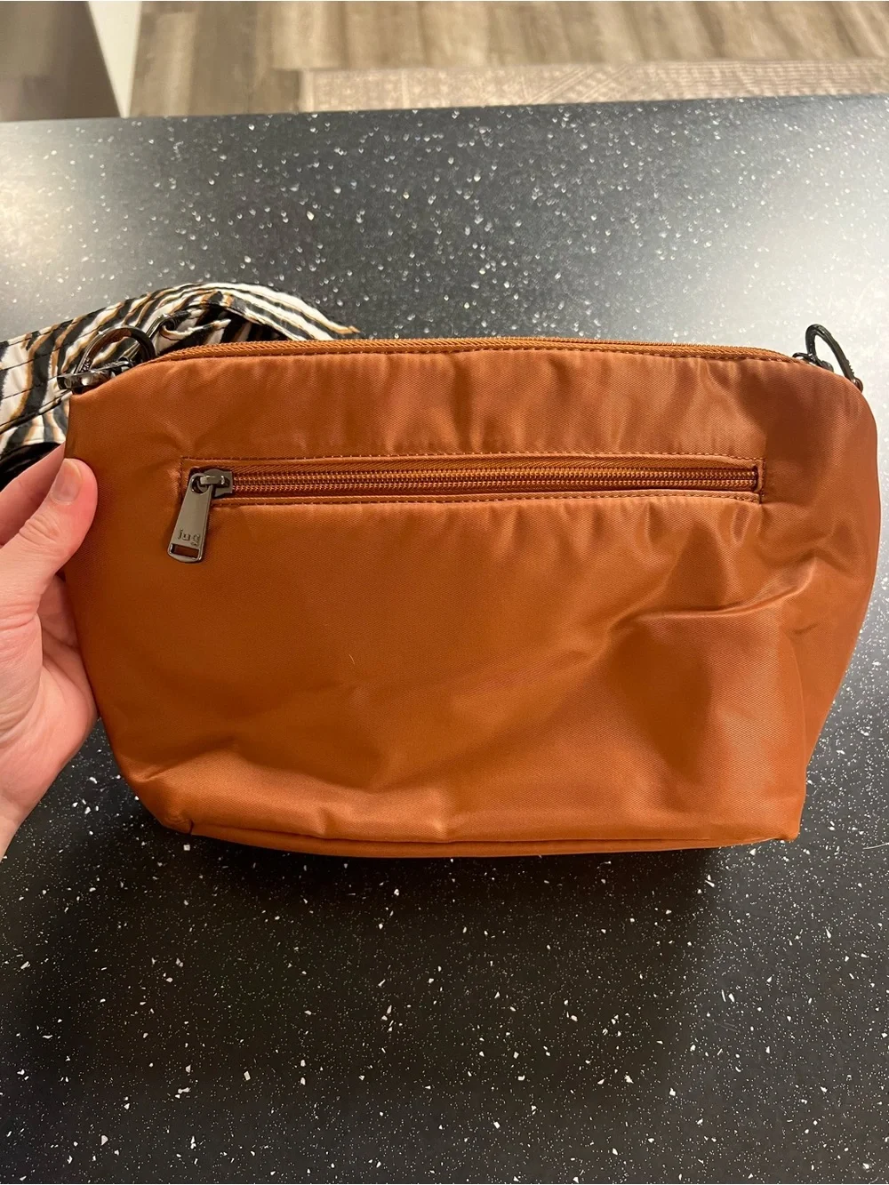lug Quilted Crossbody Bag in Burnt Orange with Zebra-Print Strap